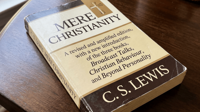 Paperback copy of C. S. Lewis’s Mere Christianity on a wooden table